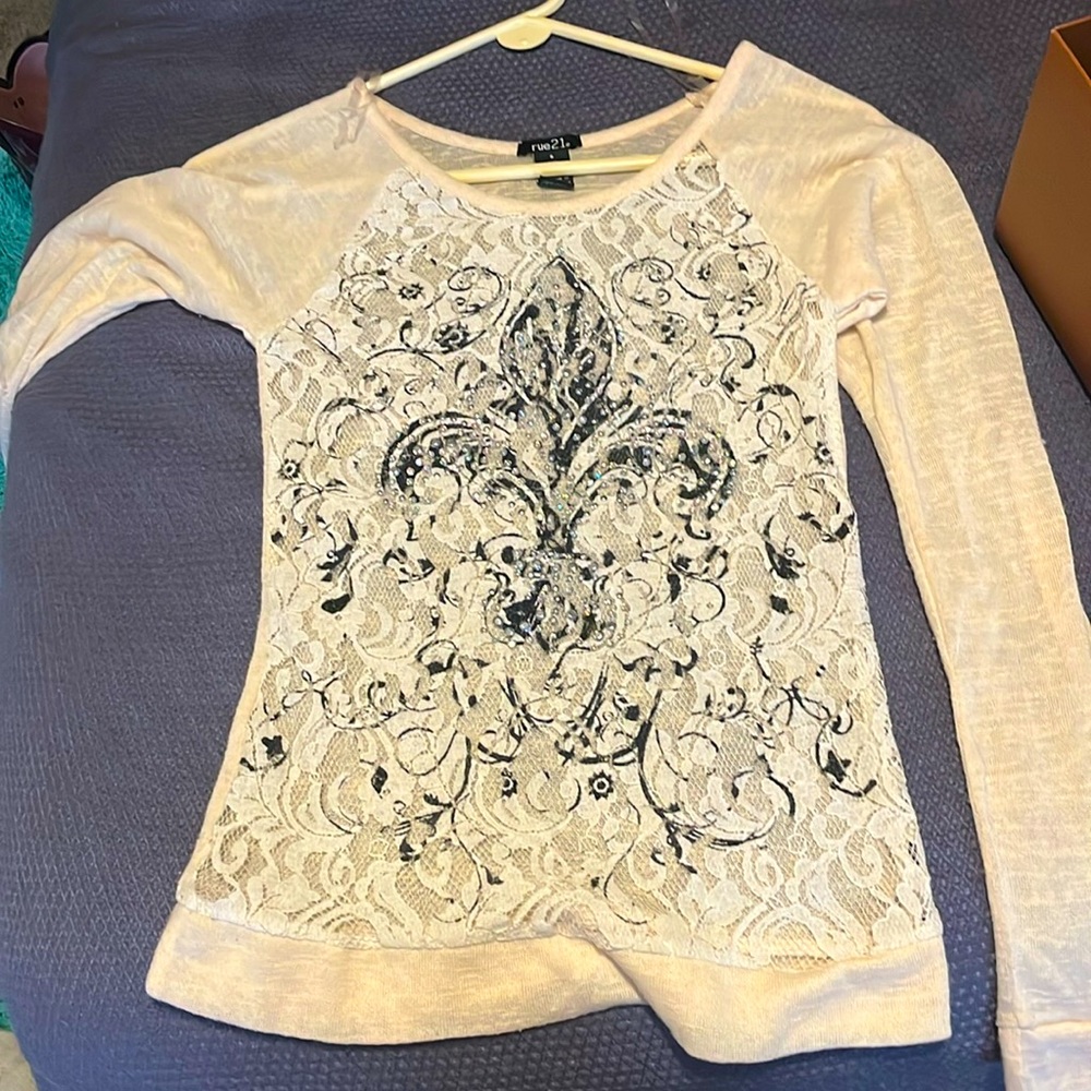 Long sleeve almost see thru, definitely wear a tank top underneath